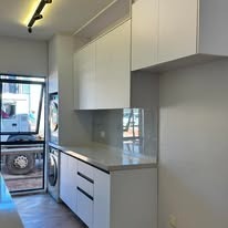 Fitted laundry cabinetry